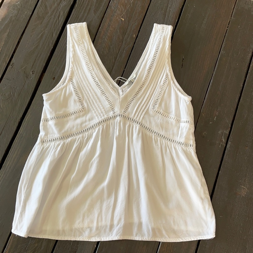 White tank with ladder trim